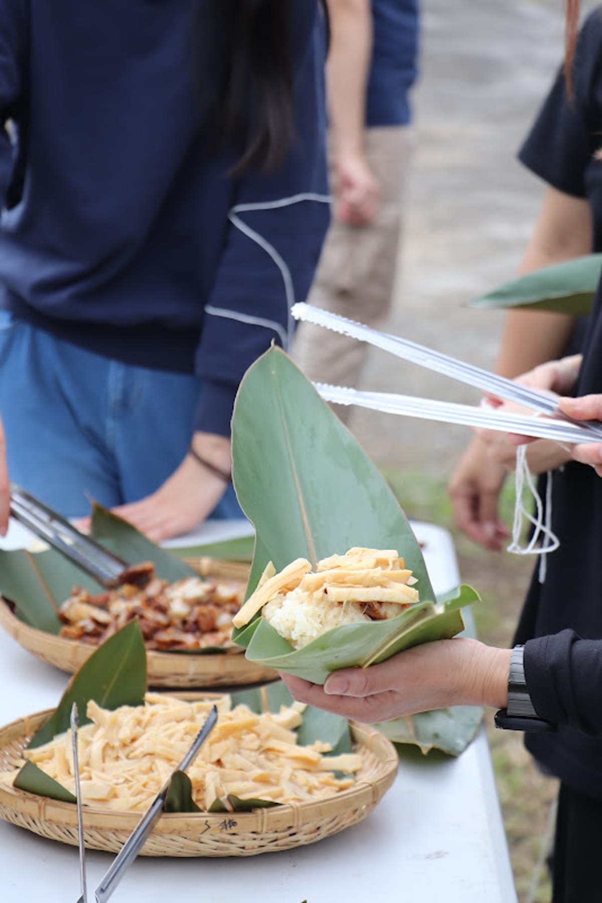 A local indigenous-style meal served on banana leaves over bamboo trays